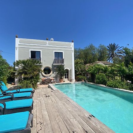 Casa Stardust & Cottages Quelfes Extérieur photo